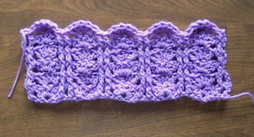 Raised double post stacked shell stitch